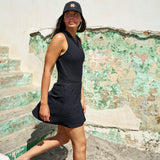 Woman wearing Black Clover Live Lucky hollywood hat in black.